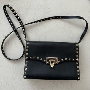 VALENTINO GARAVANI
Vitello Medium Rockstud Flip Lock Crossbody Bag Black